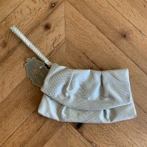 White and silver clutch